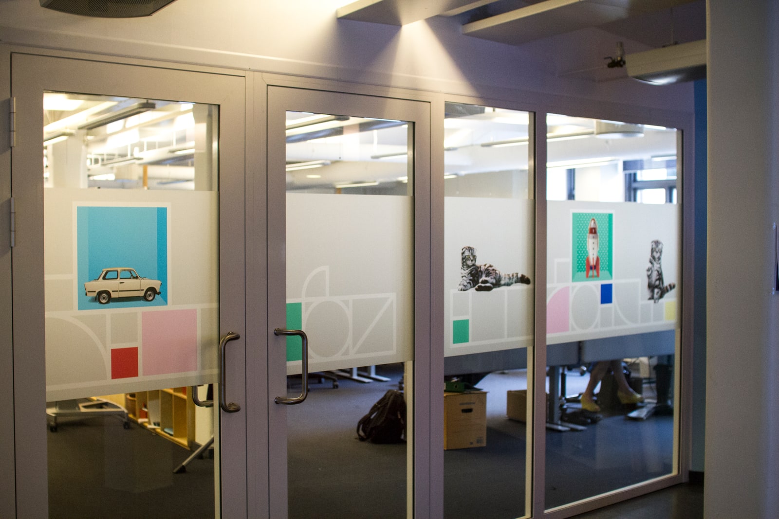 FINN meeting rooms with illustrated glass walls