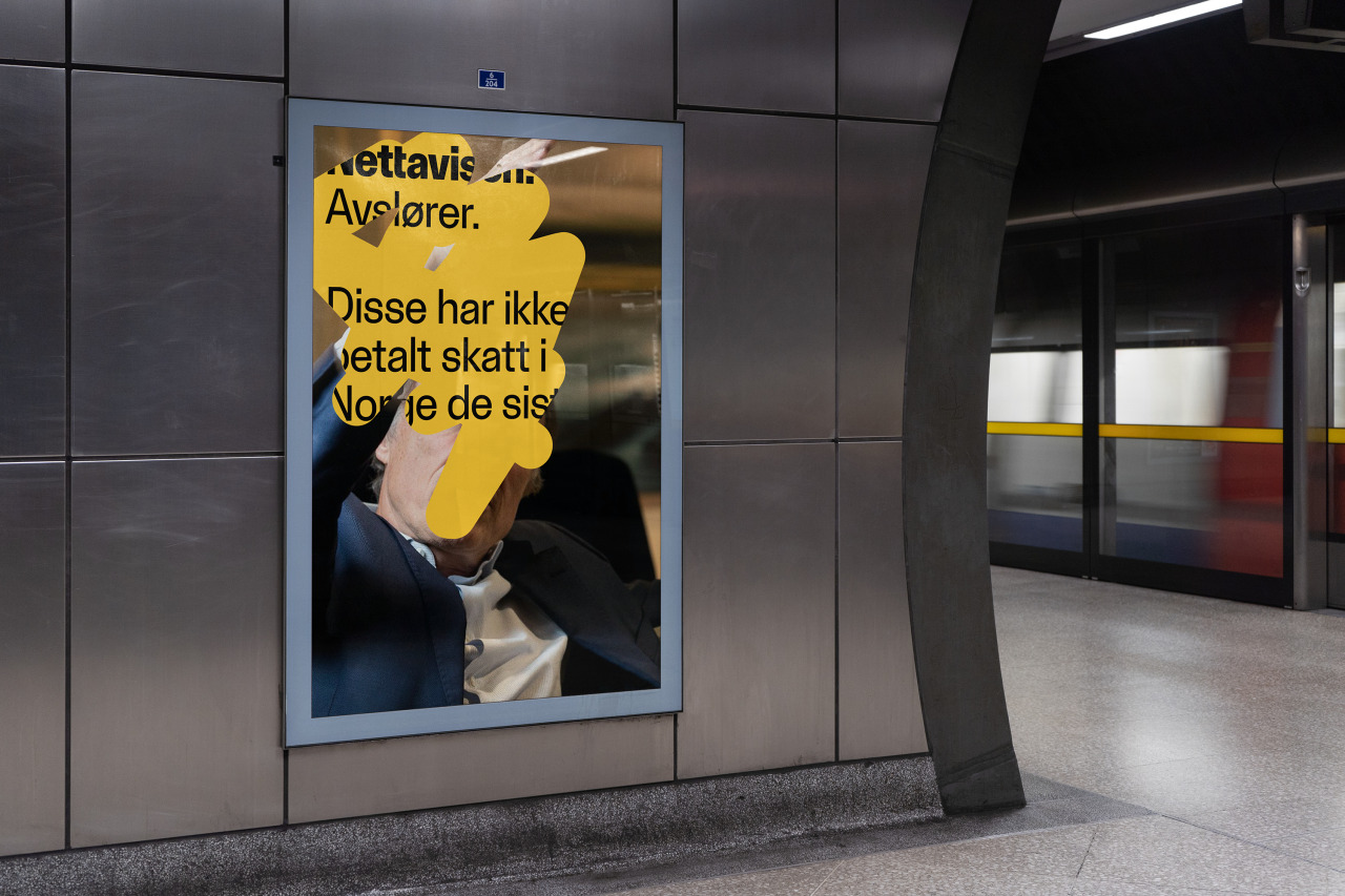 Yellow Nettavisen campaign poster in a station
